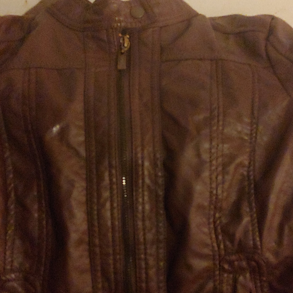 Women's Short Brown Leather Jacket.( Fairly New)